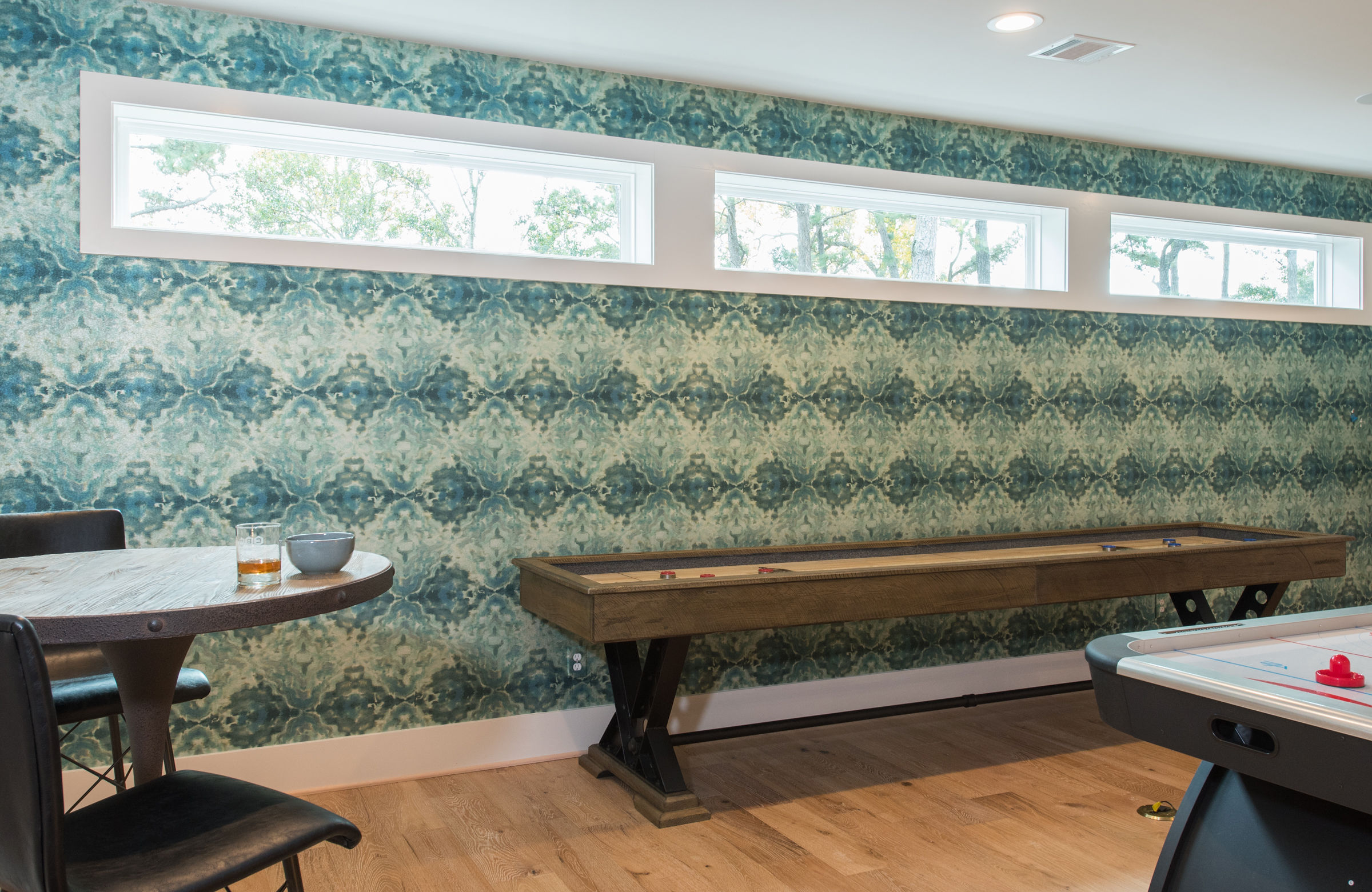 Kitchen with green painted island